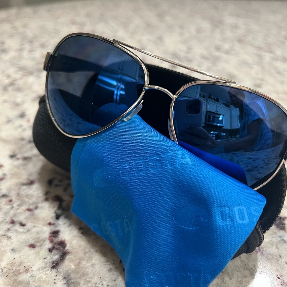Costa Silver Aviator Sunglasses with Deep Blue Lenses